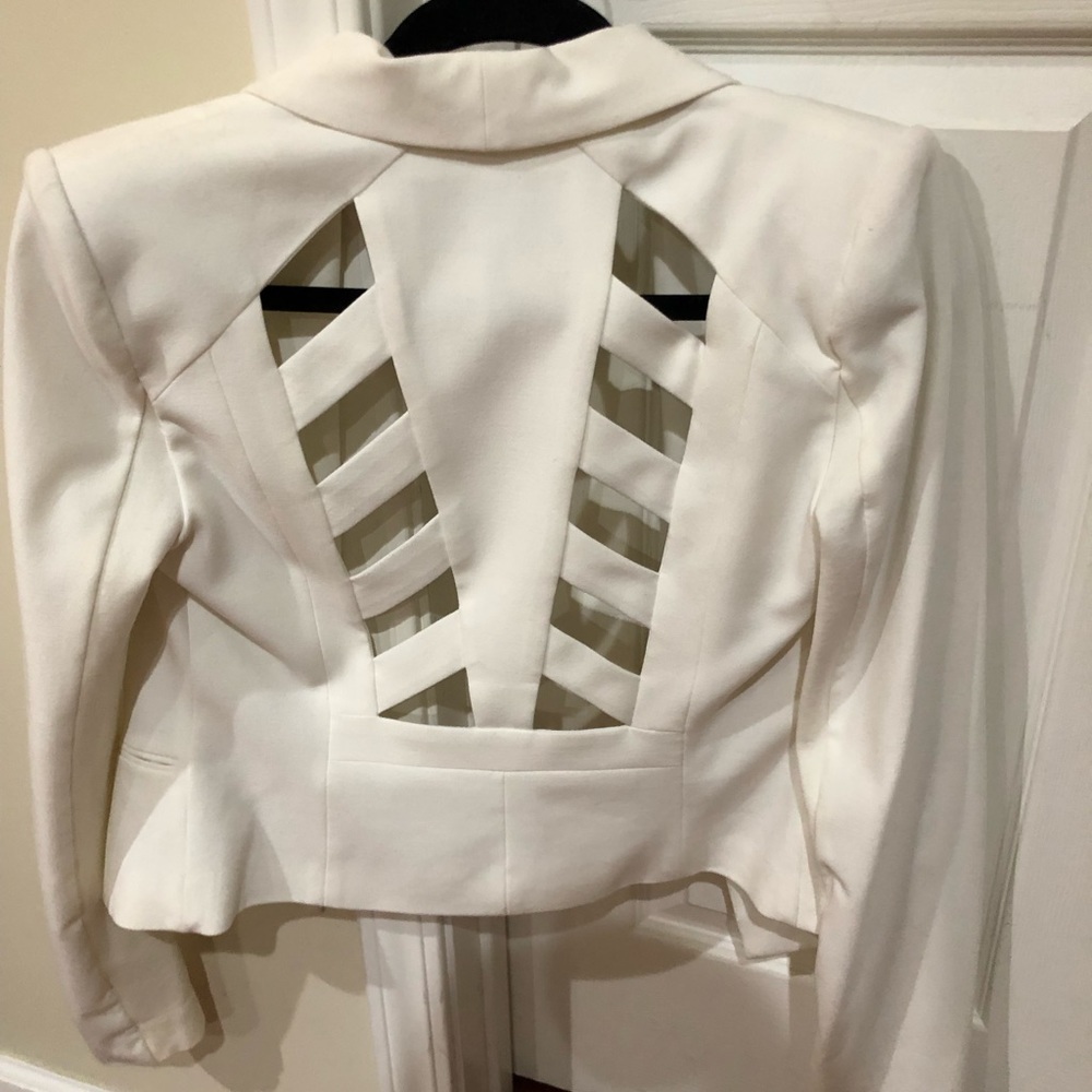 White BCBG blazer with cut outs on back
